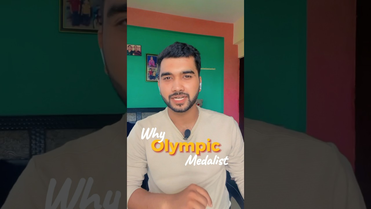 Why gold medalist bite there medals?? #india #sports #olympics