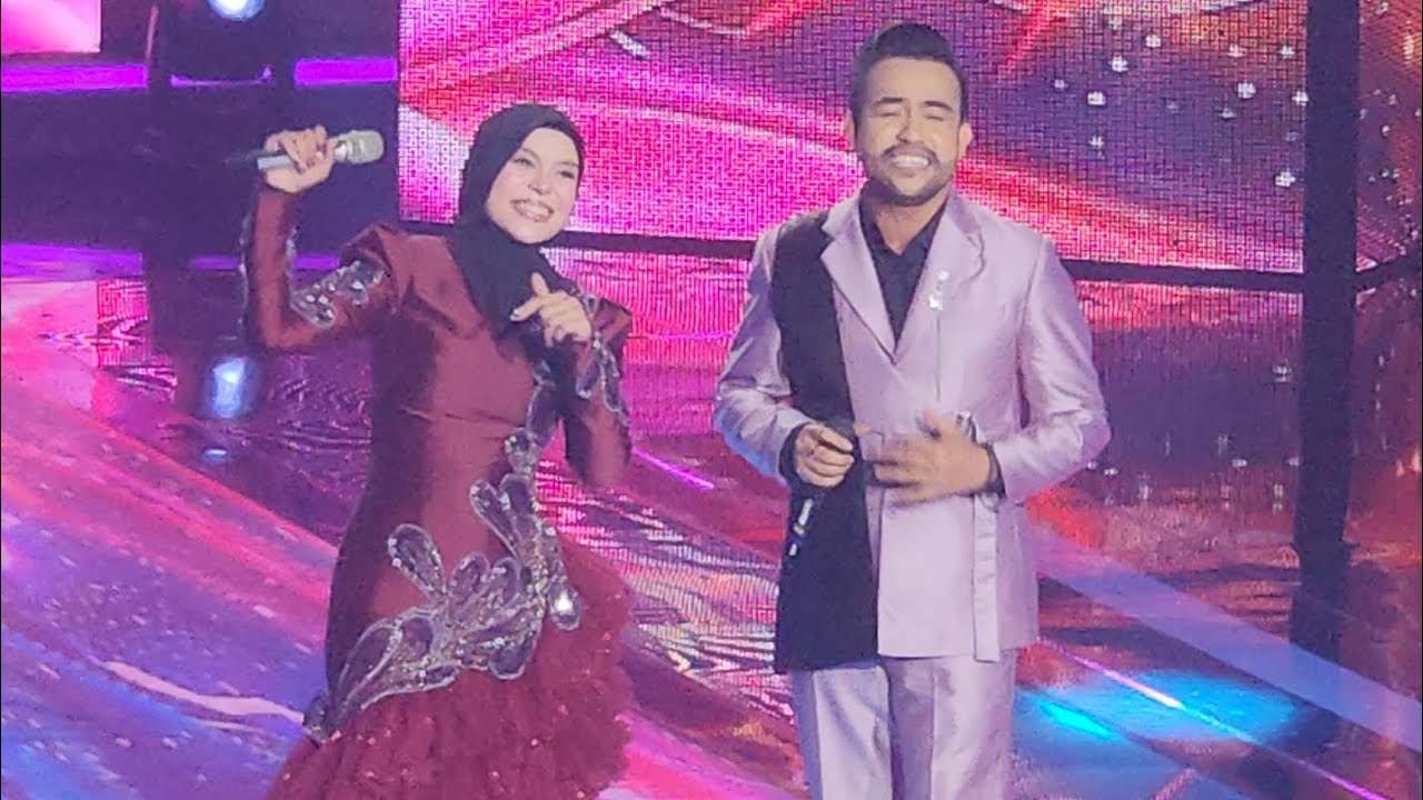 Watch DUET MAUT! Lesti Kejora ft. Fildan - Maha Cinta X Dua Pilihan (Live Mega Konser Welcome Back Lesti) on YouTube Watch DUET MAUT! Lesti Kejora ft. Fildan - Maha Cinta X Dua Pilihan (Live Mega Konser Welcome Back Lesti) on YouTube