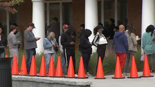 Early voting kicks off: enthusiastic metro Atlanta voters face long lines and machine malfunctions