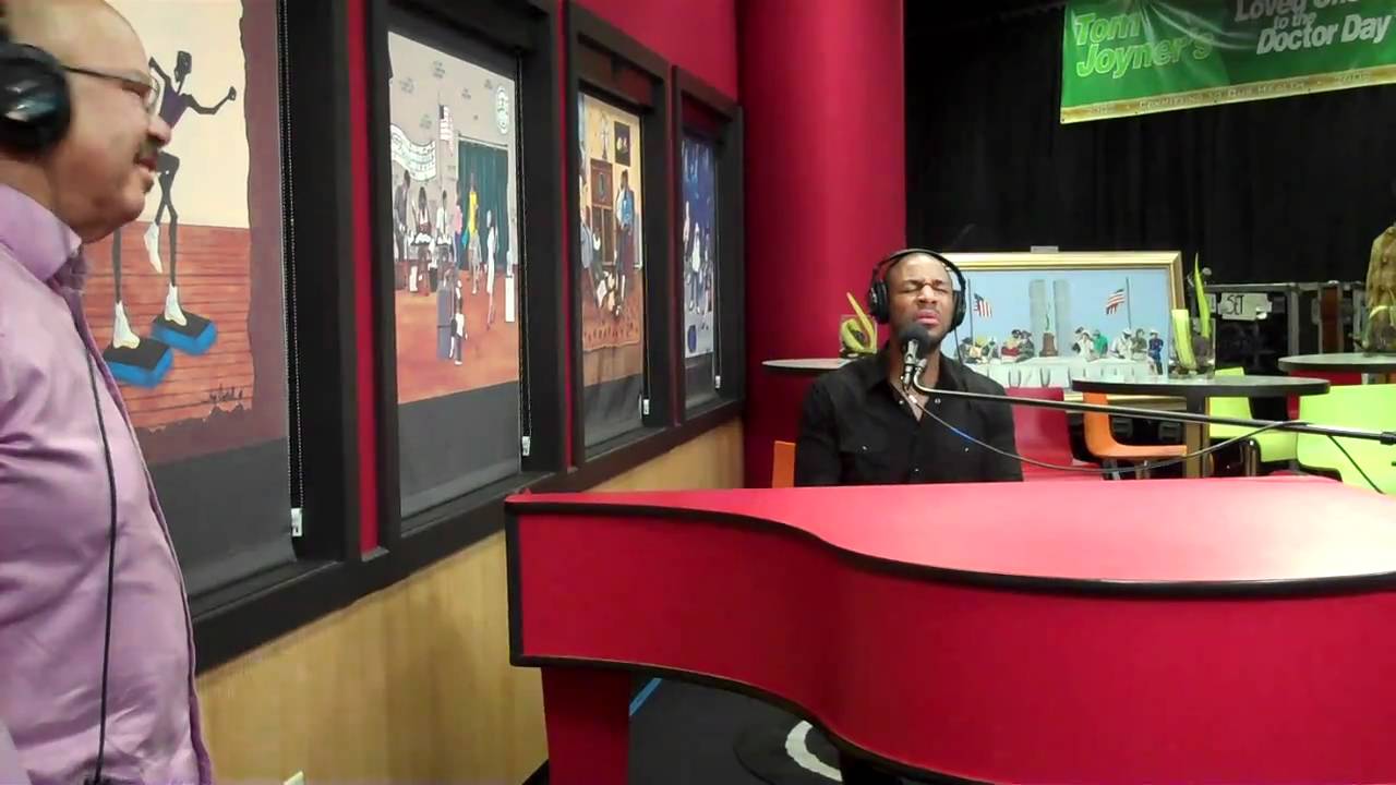 Tank performs a melody of songs while visiting the Red Velvet Cake Studio.