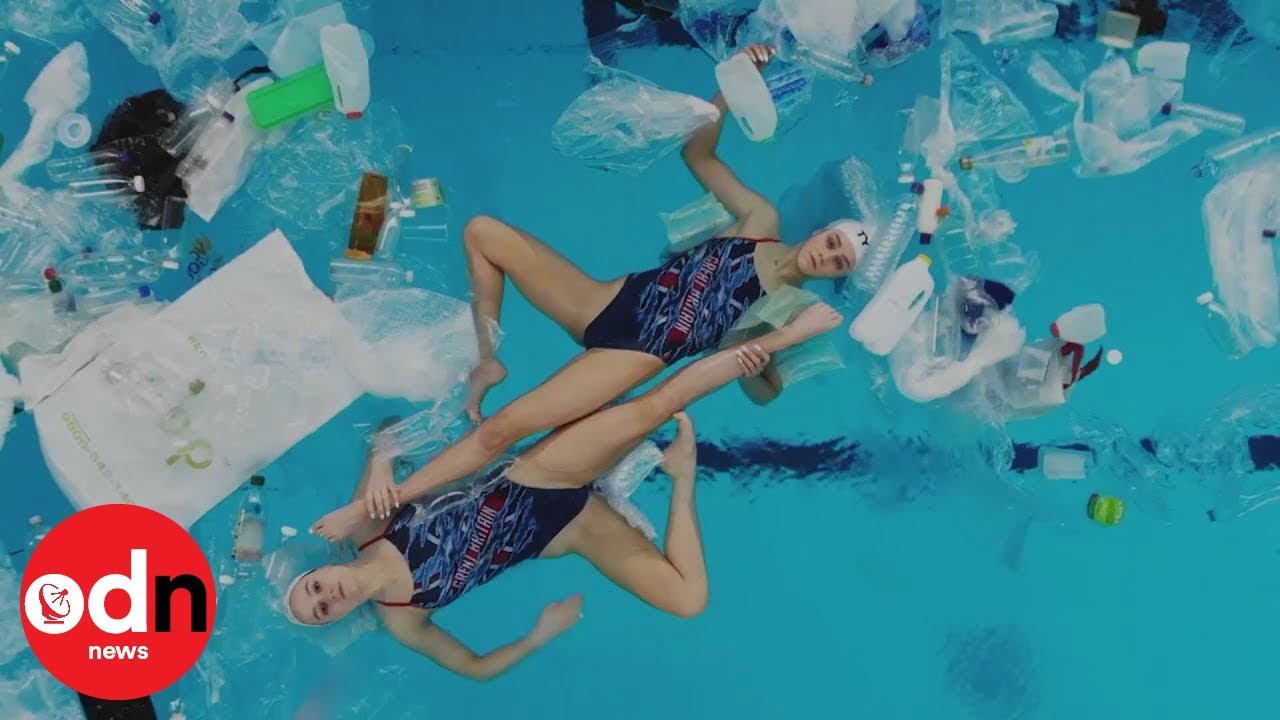Mesmerising synchronised swimmers perform in plastic-littered pool