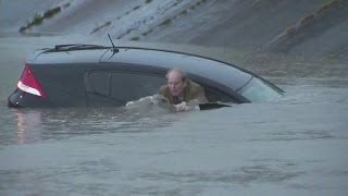 Houston flooding. Houston largely shut down amid rain, flooding