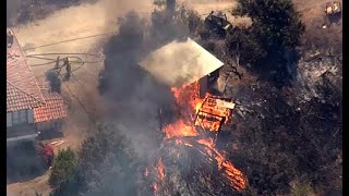 Raw video of structures burning in san jose hills brushfire