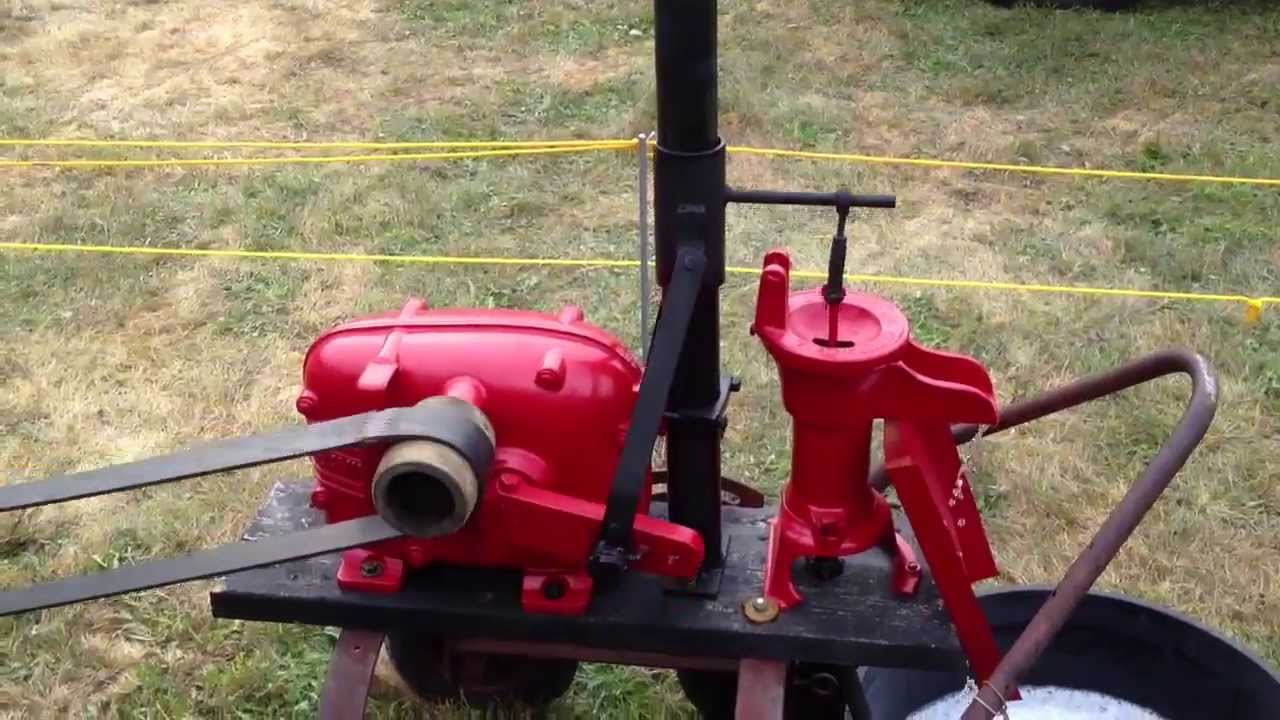 Pumping water with an antique stationary engine hit miss engine YouTube