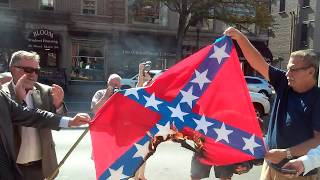Activist burns Nazi-Confederate flag - BLOOMSBURG FAIR PROTEST