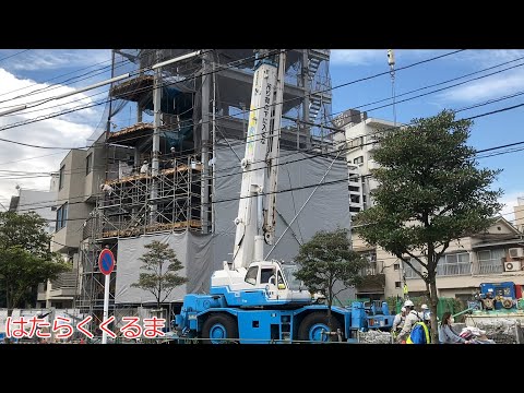 工事現場 都市 クレーン車 高層階に荷物を運搬 はたらくくるま 重機 ジューキーズ Construction site in Japan