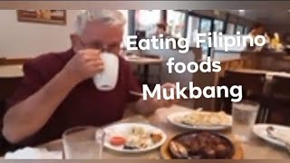 American white Man try to eat  Filipino foods at Salo-Salo restaurant