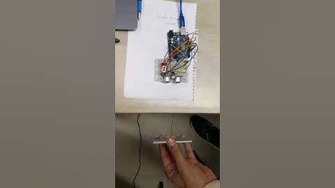 Q1)E) ultrasonic sensor to measure the distance 7 segment display