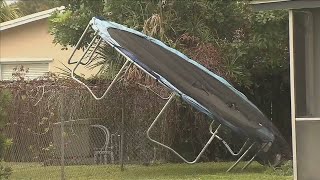 Homeowners scramble to safety after tornado knocks down trees