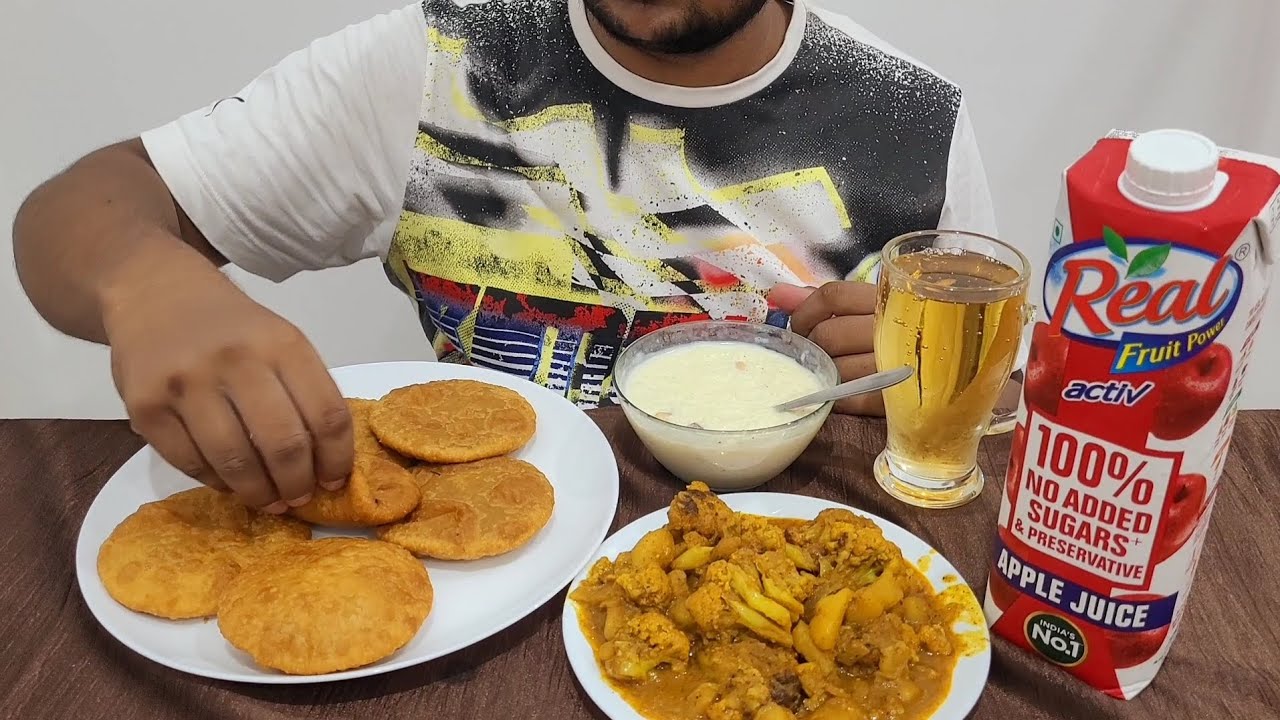 EATING KHEER DAL PURI ALOO GOBHI KI SABZI WITH REAL ACTIV APPLE JUICE