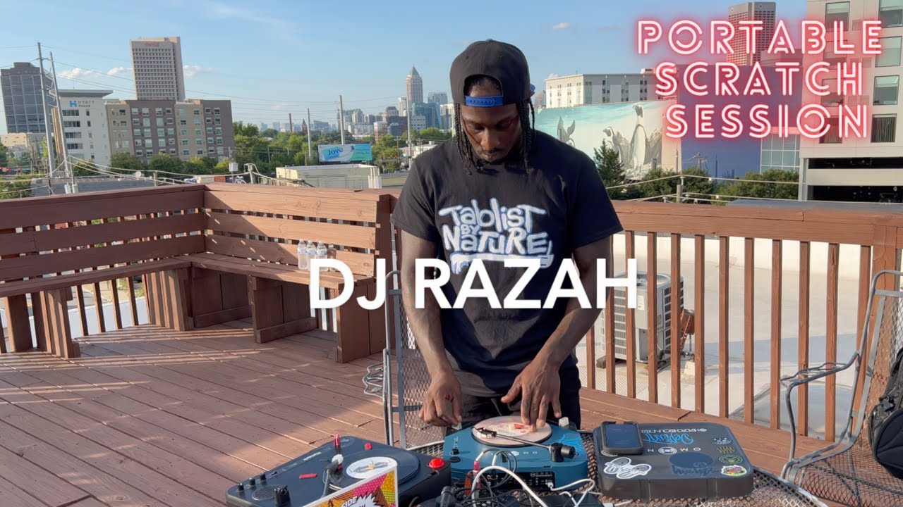 DJ Razah at the rooftop scratch session using the Headache Sound OMNI portable turntable