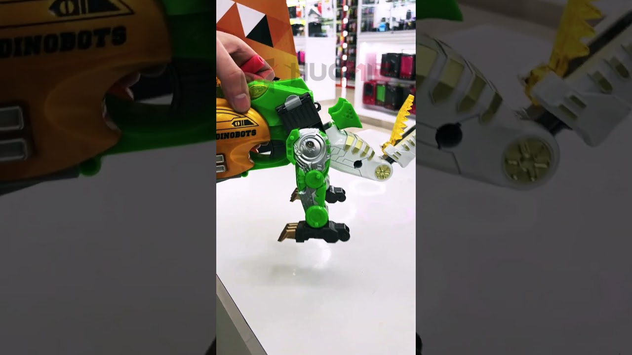 Unleash the Power of Prehistoric Meets Futuristic: Dinosaur Robot Transformer Blaster Gun Toy!