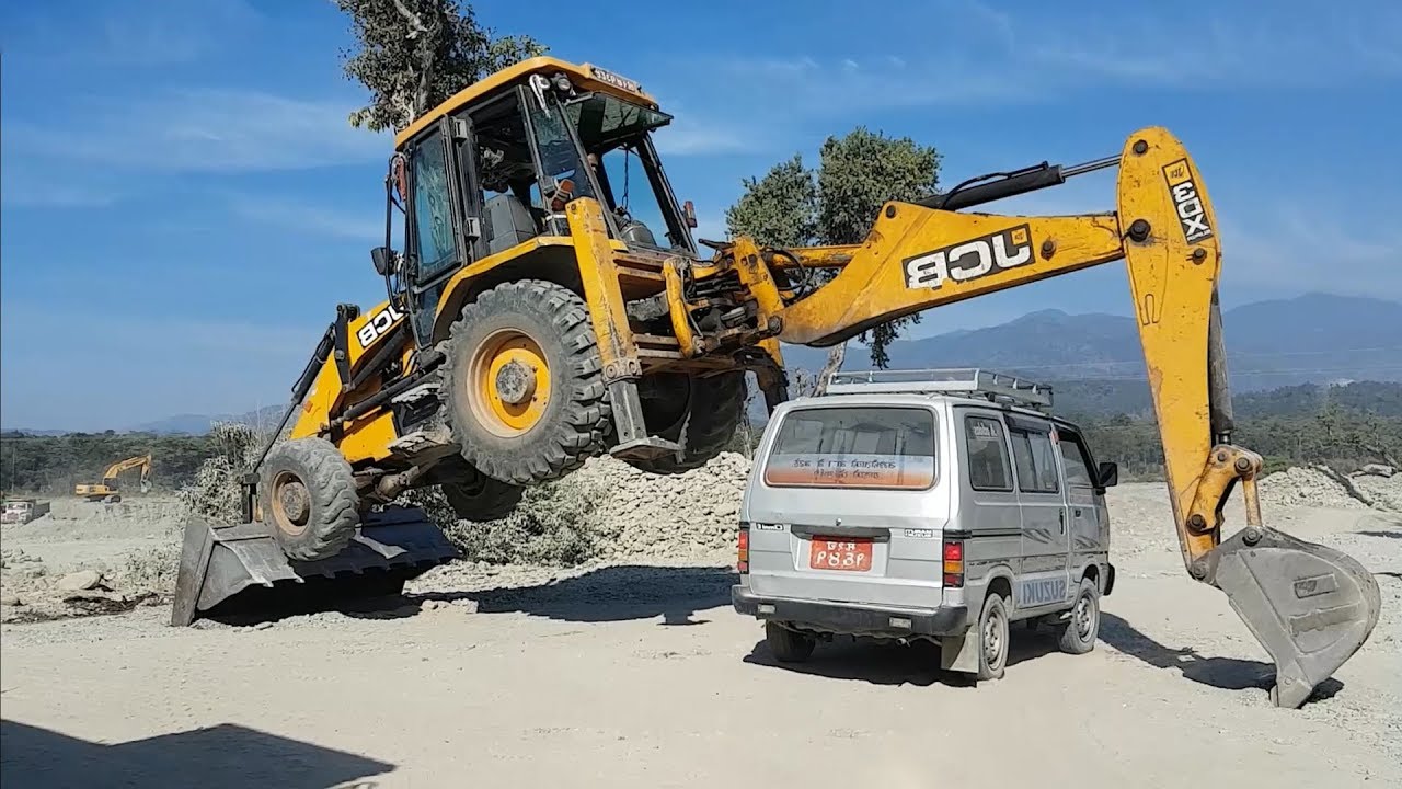 JCB Backhoe Showing Stunt and Working on Sandy Place - JCB Video