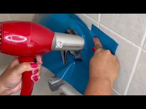 Video: Everyone will be taking down their shower curtain when they see this bathroom idea!