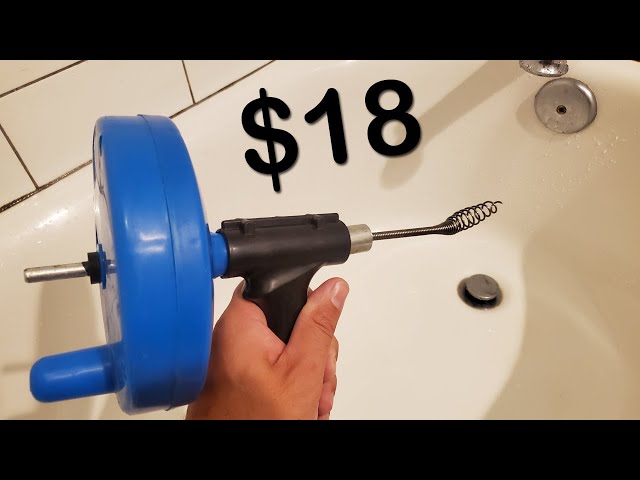 How to Unclog a Bathtub Drain Using a Snake (Drum Auger) class=