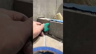 Setting a threshold for a shower.