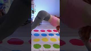 Amouranth stretching and playing twister