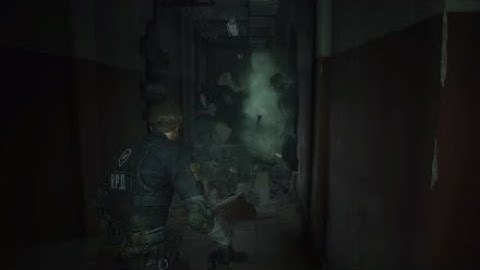 Resident Evil 2 Remake - Mr. X smashing thru a wall.