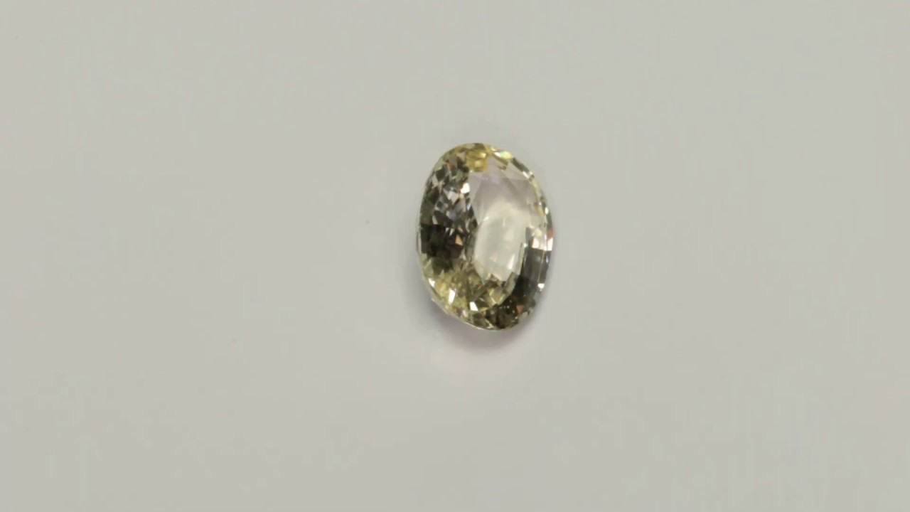 1.525 Carat Yellow Green Sapphire Very Good Cut Oval 8.29 x 6.09 mm Non Heated Loose Stone