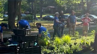 Volunteers install native plants in Chamblee creek