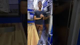 Mountain Bluebird camper van electrically lifting bed