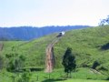 Steep and rutted hill in a near standard Toyota Prado