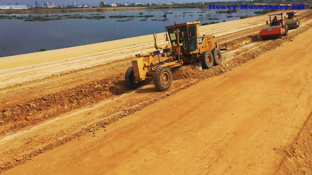 Grader Compaction CAT 140K Motor Grader Grading Soil Build New Road And HAMM Road Roller ...