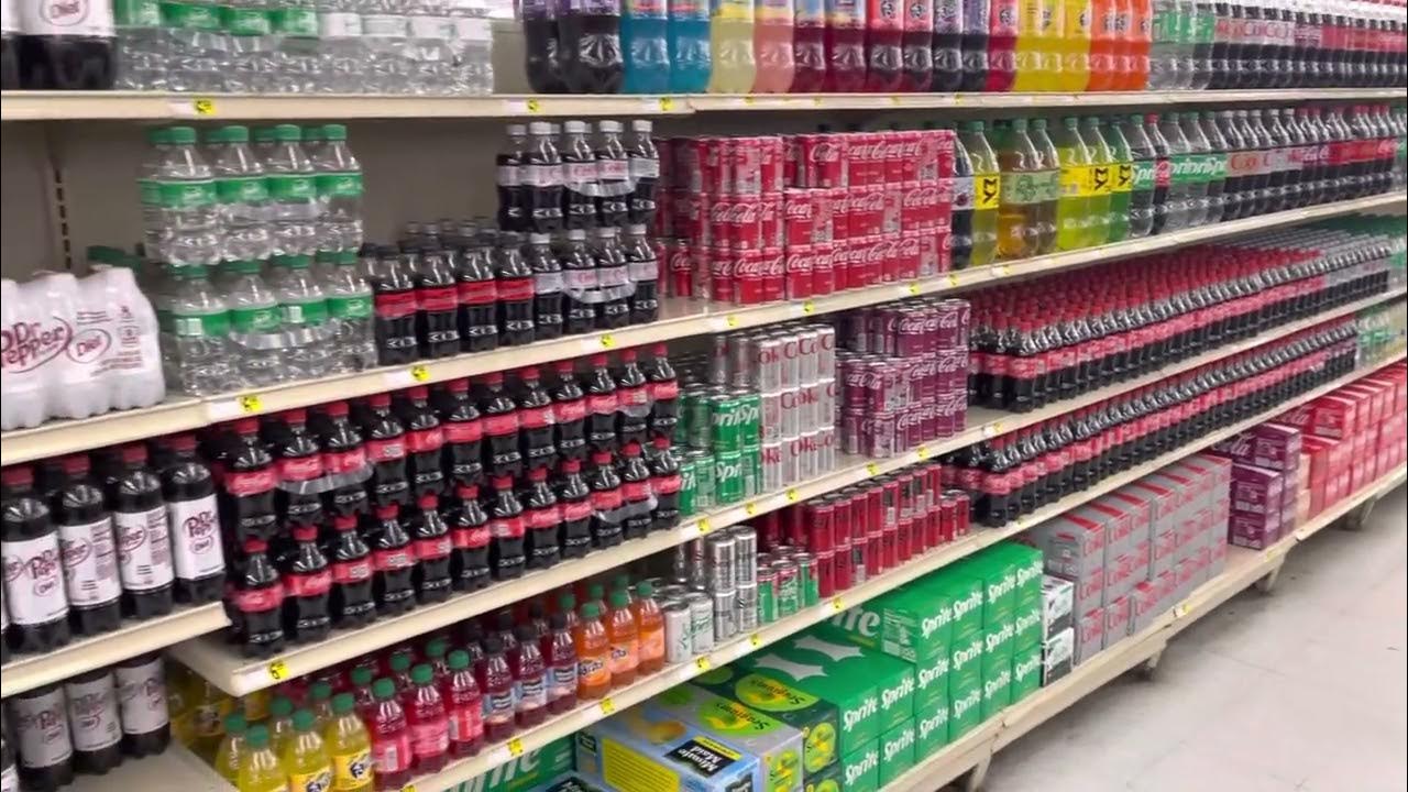 Day in the life of a Coca Cola merchandiser title making the aisle neat