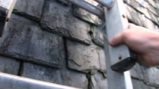 Repair a slipped slate on a roof