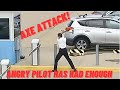 Angy Pilot Grabs An Axe