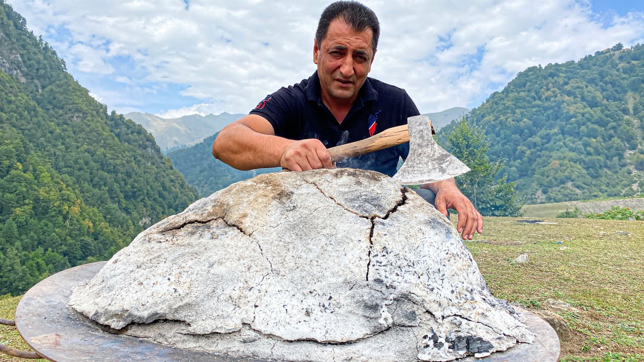 ⁣Whole LAMB Cooked under a thick layer of SALT high in the mountains! Village life
