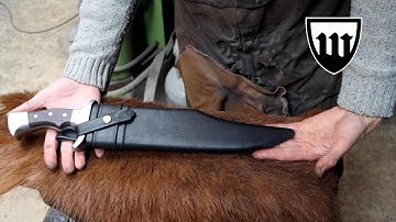 Forging a huge bowie knife, part 2, making the scabbard.