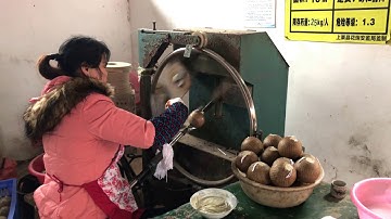Wrapping The Fireworks Shell by Machine