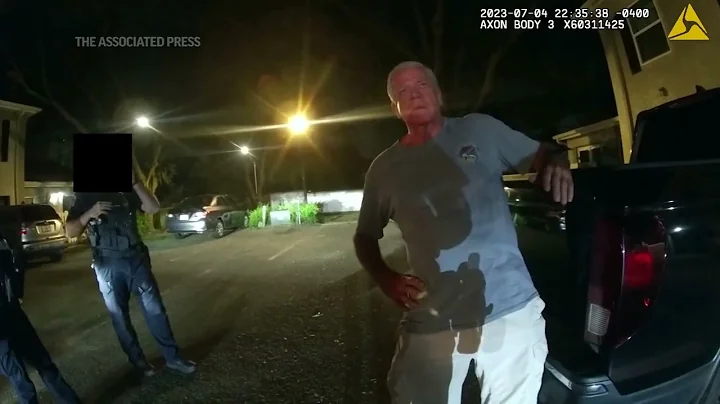 Body cam shows prolific federal drug prosecutor offering cops business card in DUI crash arrest