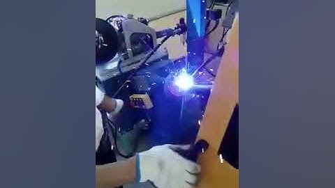 Automatic scaffolding base plate welding machine