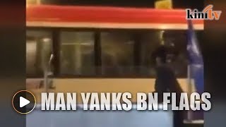 Another video of BN flags being yanked surfaces
