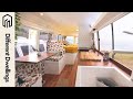 [BUS TOUR] Couple converts Toyota bus into GORGEOUS tiny home on wheels // DIFFERENT DWELLINGS ep01