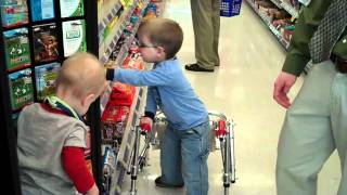 Caleb walking at Walgreens