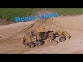 [Drone video] Cat 160H grading sand