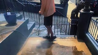 Pretreating with a foam cannon pressure washing a filthy concrete patio DIY #diy  #pressurewashing