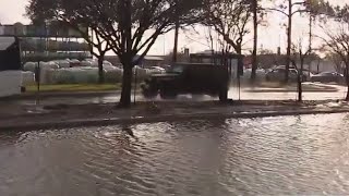 Jeep pushes way through flood waters in West Houston screenshot 3