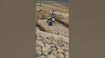 BOX CULVERT FLEXIBLE APPRON AND BOULDER PITCHING WORK