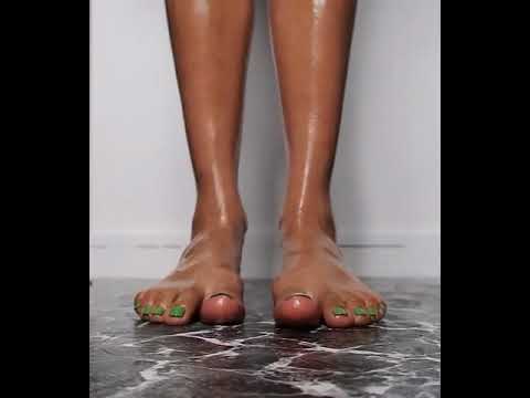 Oily high arched beautiful feet