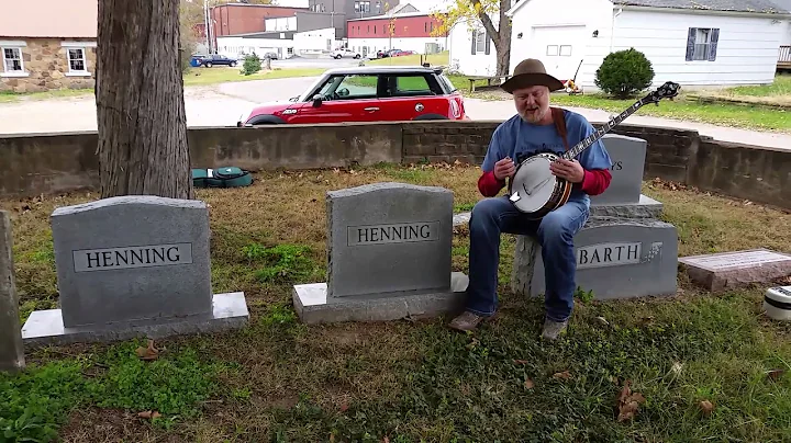 At the grave of Paul Henning, creator of the Bever...