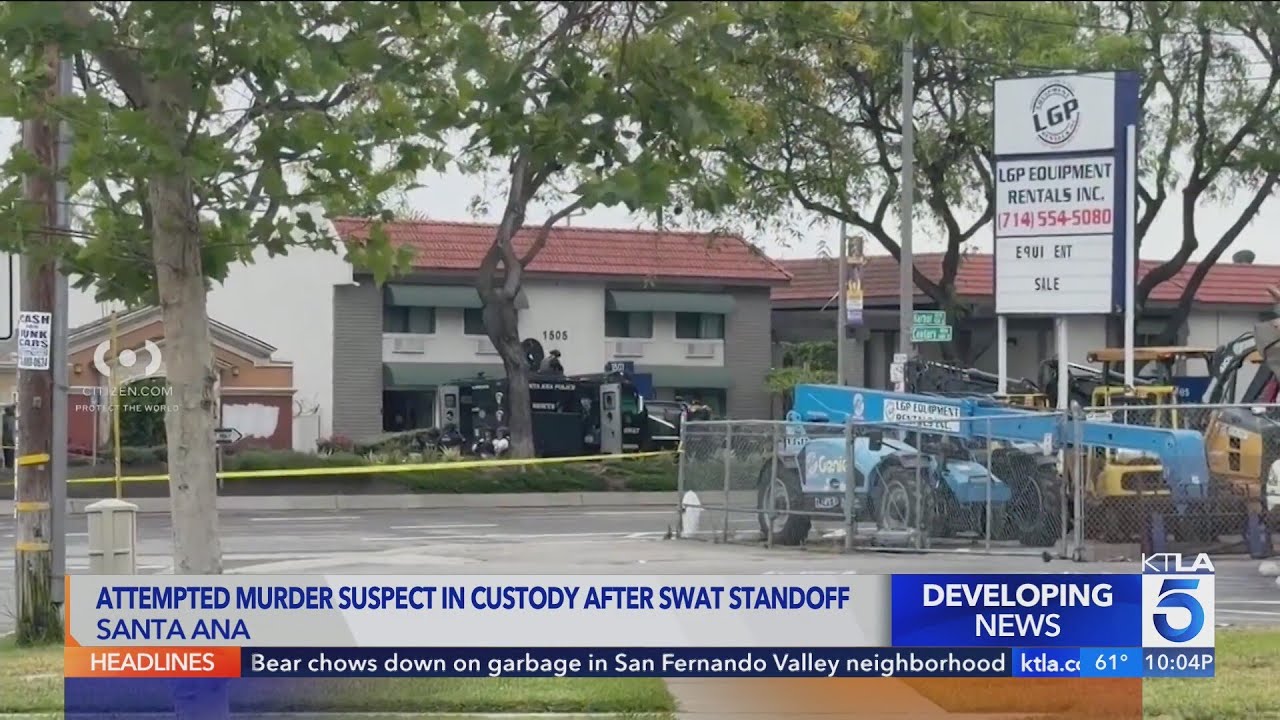 Attempted murder suspect in custody after O.C. standoff - YouTube