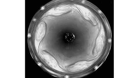 Shear-layer instability in a rotating flow with a free surface