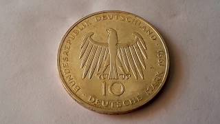 A silver German 10 Deutsche Mark unification coin