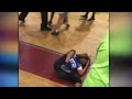Man seen punching teen during high school basketball fight