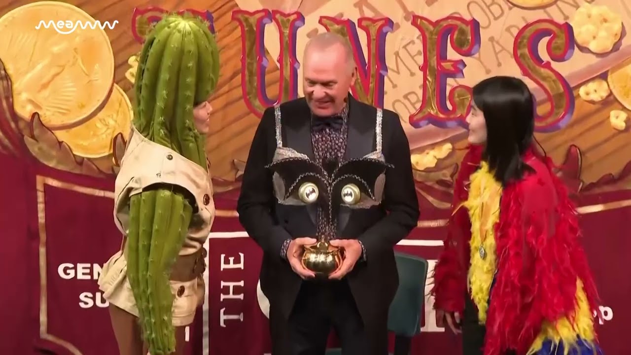 Michael Keaton Celebrates Harvard Honor in Bra With Kisses