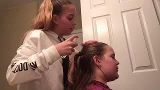 Doing her hair/W Emma